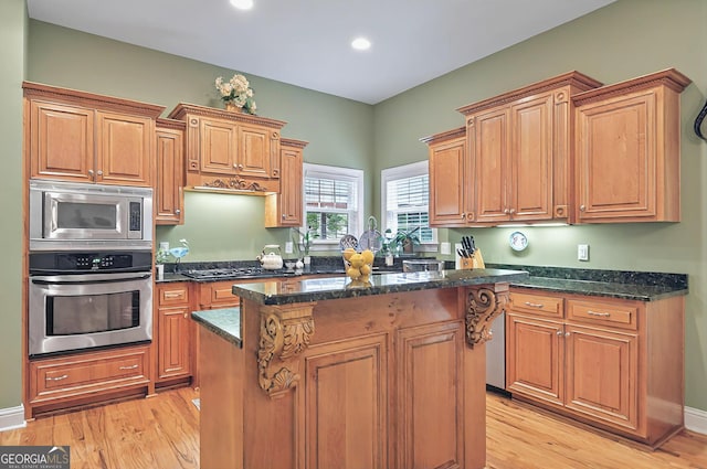 229 Old Plantation Trl NW, Milledgeville, GA 31061 - kitchen with recessed lighting, appliances with stainless steel finishes, a center island, and light wood-type flooring