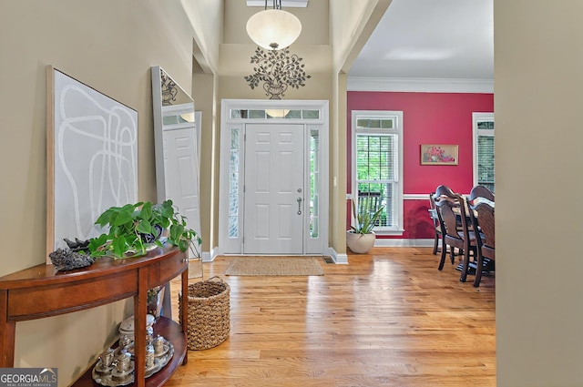 229 Old Plantation Trl NW, Milledgeville, GA 31061 - entryway featuring baseboards, ornamental molding, and wood finished floors