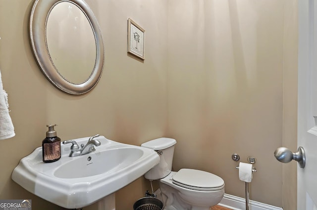 229 Old Plantation Trl NW, Milledgeville, GA 31061 - bathroom featuring toilet and a sink