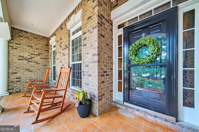 229 Old Plantation Trl NW, Milledgeville, GA 31061 - entrance to property featuring covered porch and brick siding
