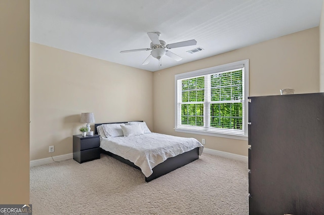 229 Old Plantation Trl NW, Milledgeville, GA 31061 - carpeted bedroom with baseboards, ceiling fan, and visible vents
