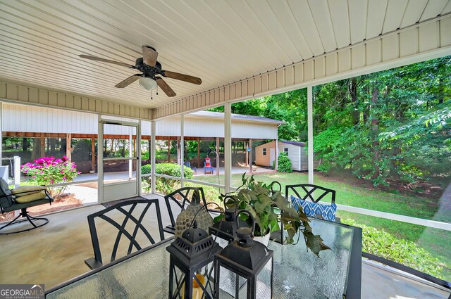 229 Old Plantation Trl NW, Milledgeville, GA 31061 - sunroom / solarium featuring outdoor dining area and ceiling fan