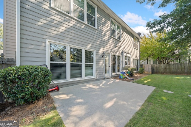 rear view of house featuring a patio
