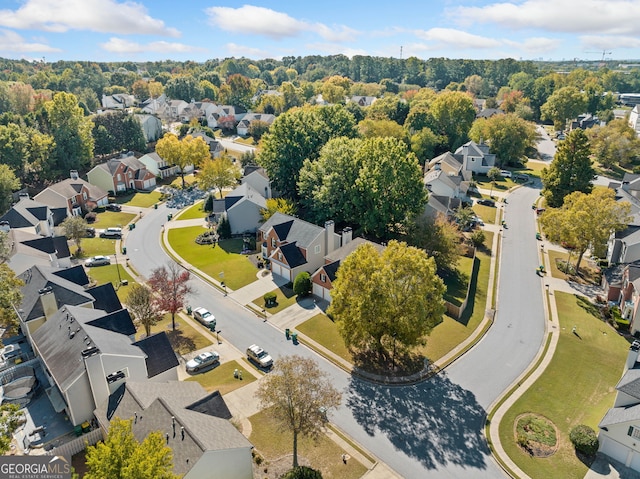 aerial view of property's location featuring nearby suburban area