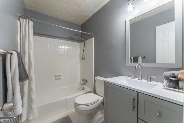 full bath with toilet, vanity, shower / tub combo, a textured ceiling, and tile patterned floors