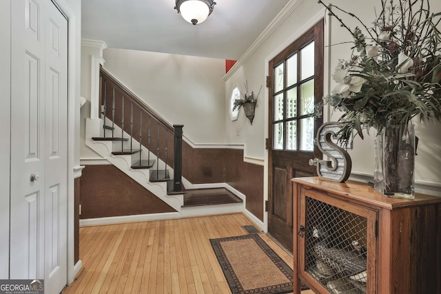 159 May Ln, Zebulon, GA 30295 - foyer featuring ornamental molding, wainscoting, stairs, and hardwood / wood-style flooring
