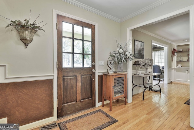 159 May Ln, Zebulon, GA 30295 - entryway featuring visible vents, ornamental molding, and light wood finished floors