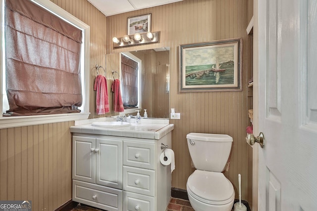 159 May Ln, Zebulon, GA 30295 - half bathroom with vanity, wood walls, and toilet