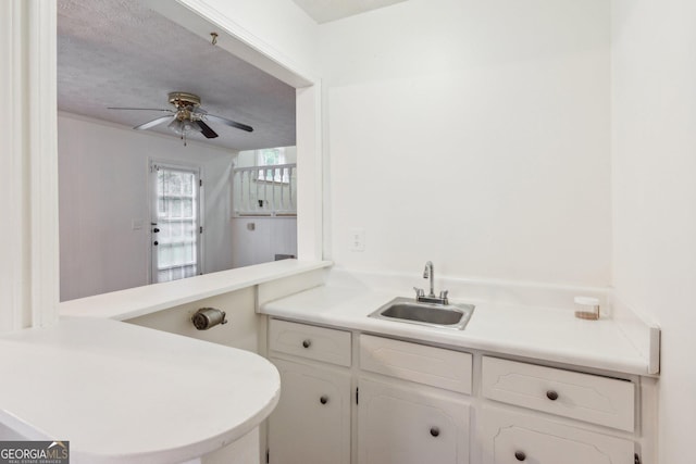 3240 Corktree Trl, Stonecrest, GA 30038 - bathroom featuring a sink and a ceiling fan
