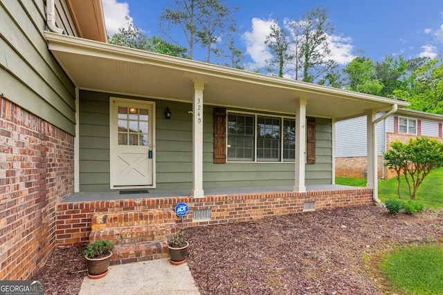 3240 Corktree Trl, Stonecrest, GA 30038 - view of exterior entry with a porch and crawl space