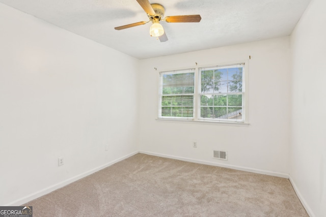 3240 Corktree Trl, Stonecrest, GA 30038 - carpeted empty room featuring a ceiling fan, baseboards, and visible vents