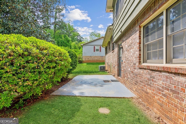 3240 Corktree Trl, Stonecrest, GA 30038 - view of yard with cooling unit and a patio area