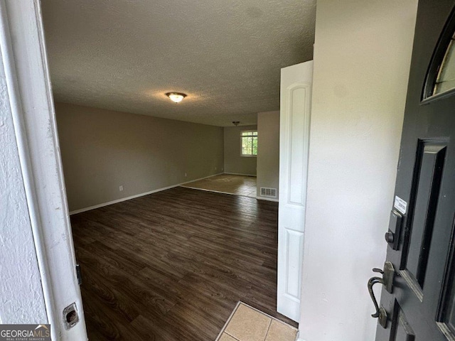 2036 Countydown Ln, Stone Mountain, GA 30088 - unfurnished room featuring a textured ceiling, wood finished floors, and baseboards