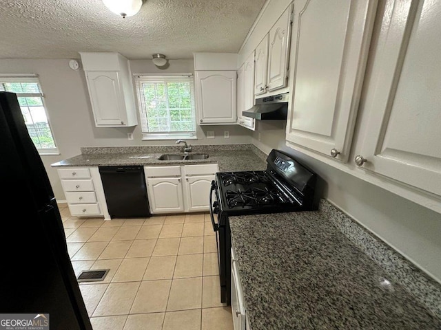 2036 Countydown Ln, Stone Mountain, GA 30088 - kitchen featuring black appliances, a sink, under cabinet range hood, plenty of natural light, and a textured ceiling