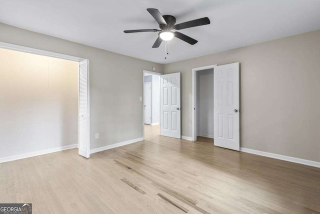 2013 Ridge Rd, Dallas, GA 30157 - unfurnished bedroom featuring wood finished floors and ceiling fan