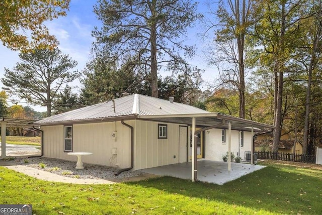 2013 Ridge Rd, Dallas, GA 30157 - view of property exterior with a patio and a metal roof