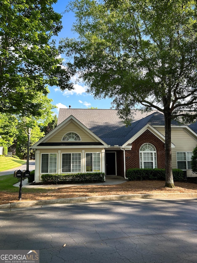 3077 Oakside Cir, Milton, GA 30004 - ranch-style house featuring brick siding and roof with shingles