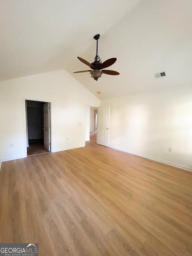 3077 Oakside Cir, Milton, GA 30004 - spare room with a ceiling fan, lofted ceiling, and light wood-type flooring