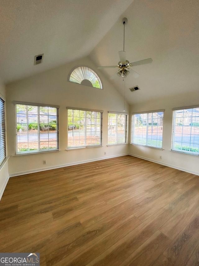 3077 Oakside Cir, Milton, GA 30004 - unfurnished sunroom featuring vaulted ceiling