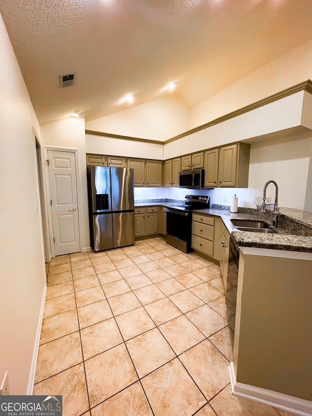 3077 Oakside Cir, Milton, GA 30004 - kitchen with stainless steel appliances, lofted ceiling, light tile patterned flooring, a peninsula, and dark stone counters