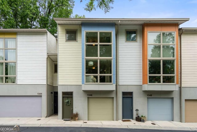 1346 Peter Haughton Way NW, Atlanta, GA 30318 - multi unit property featuring a garage and stucco siding