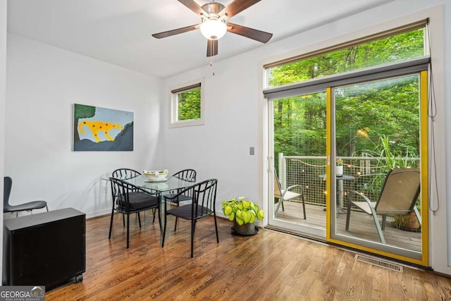 1346 Peter Haughton Way NW, Atlanta, GA 30318 - dining room with a ceiling fan and wood finished floors
