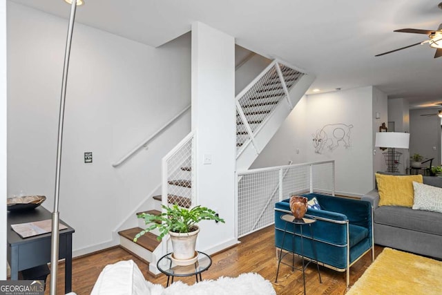 1346 Peter Haughton Way NW, Atlanta, GA 30318 - living room with ceiling fan, stairs, and wood finished floors