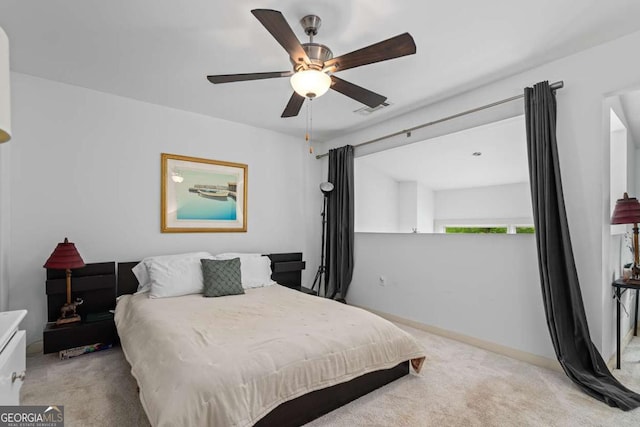 1346 Peter Haughton Way NW, Atlanta, GA 30318 - bedroom with carpet flooring, ceiling fan, and baseboards