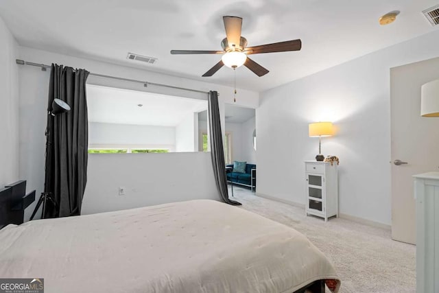 1346 Peter Haughton Way NW, Atlanta, GA 30318 - carpeted bedroom featuring ceiling fan and baseboards