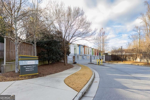 1346 Peter Haughton Way NW, Atlanta, GA 30318 - view of asphalt street with sidewalks, curbs, and street lighting