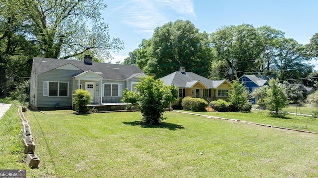 1774 Campbellton Rd, Atlanta, GA 30311 - view of front of home featuring a chimney and a front lawn