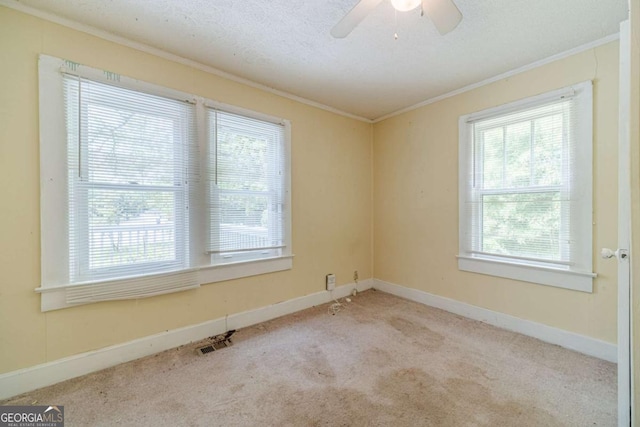 19 W New St, Winder, GA 30680 - carpeted empty room featuring visible vents, ornamental molding, baseboards, and a ceiling fan