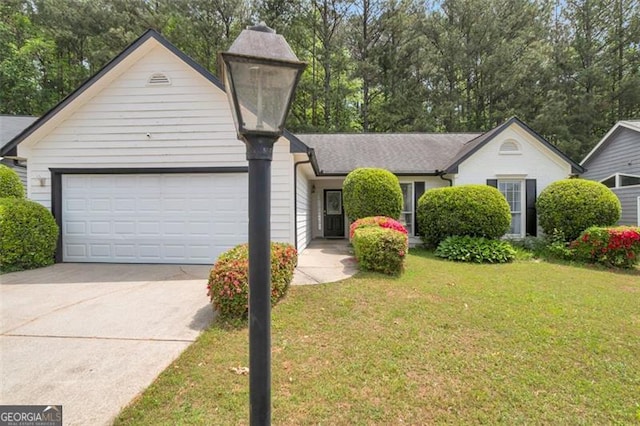 3130 Jorden Crest Ct, Lawrenceville, GA 30044 - view of front of property with an attached garage, concrete driveway, and a front lawn