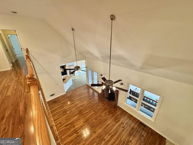 details featuring visible vents, baseboards, ceiling fan, and wood finished floors