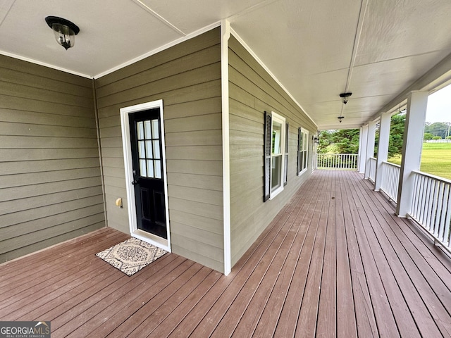 deck with covered porch