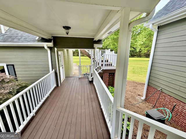wooden terrace featuring a porch