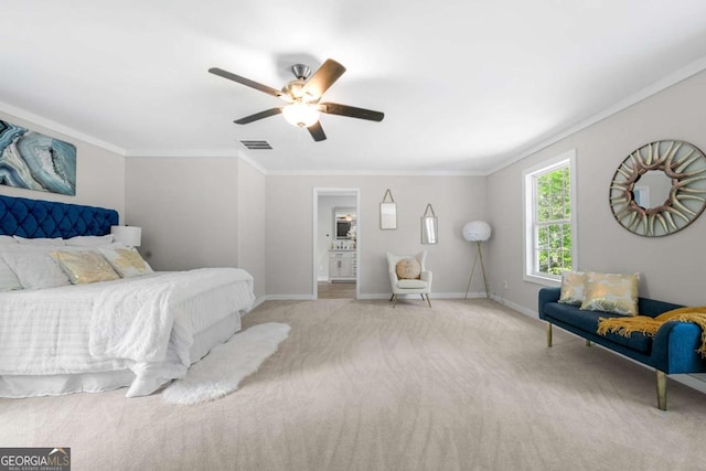 carpeted bedroom with visible vents, baseboards, and crown molding