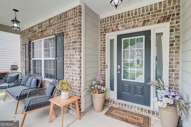 5601 Savannah River Rd, Atlanta, GA 30349 - view of exterior entry with brick siding and covered porch