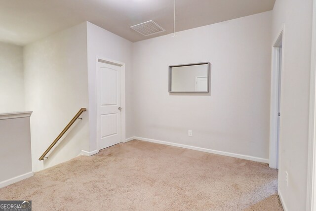 5601 Savannah River Rd, Atlanta, GA 30349 - empty room with carpet floors, baseboards, visible vents, and attic access