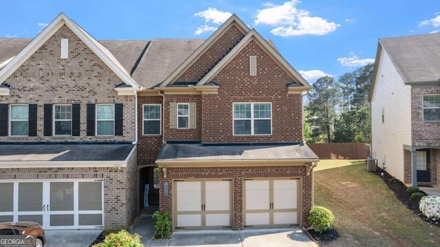 1155 Hampton Oaks Dr, Alpharetta, GA 30004 - multi unit property with brick siding, an attached garage, driveway, and a shingled roof