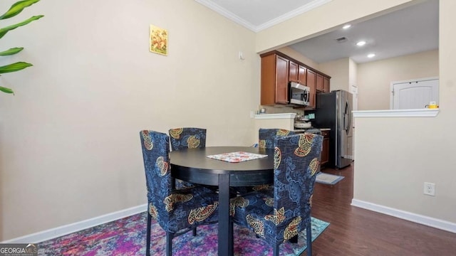 1155 Hampton Oaks Dr, Alpharetta, GA 30004 - dining room featuring dark wood-style flooring, visible vents, baseboards, ornamental molding, and recessed lighting