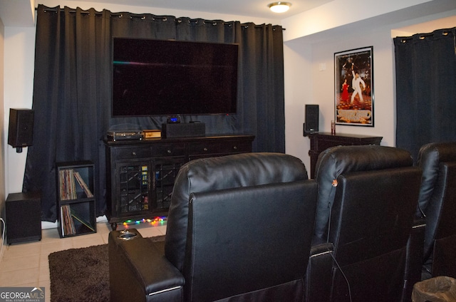 cinema room with light tile patterned floors