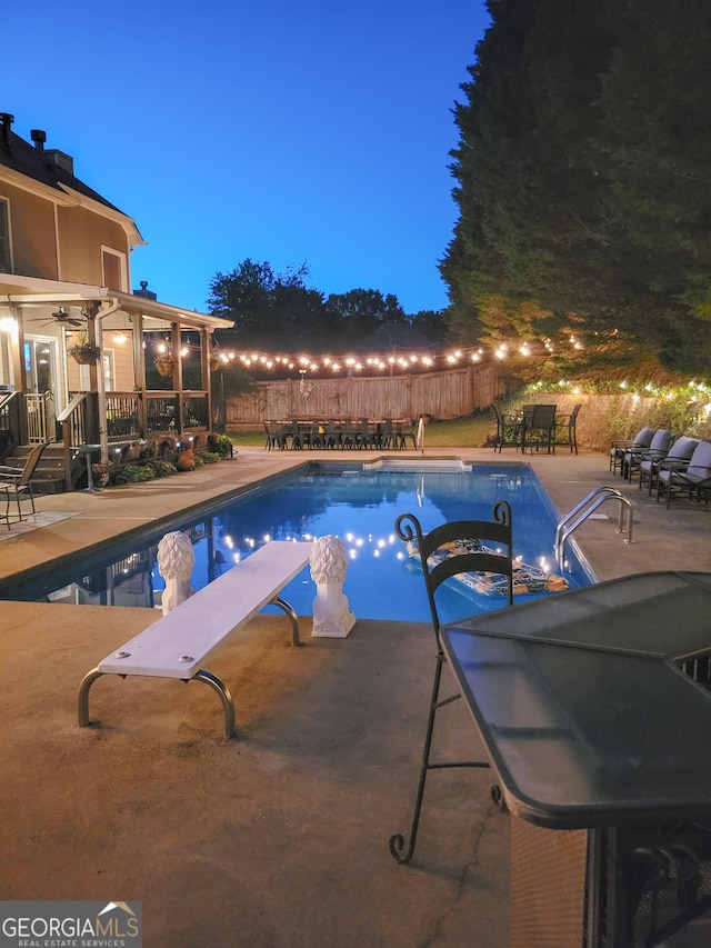 view of pool with a fenced in pool, a fenced backyard, and a patio area