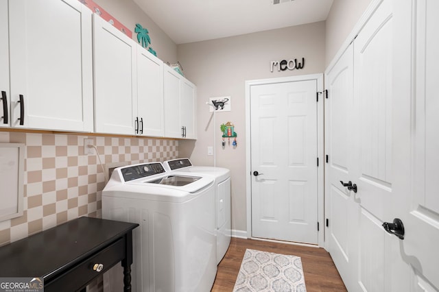 109 Aspen Way, Dallas, GA 30157 - clothes washing area featuring cabinet space, separate washer and dryer, and dark wood-type flooring