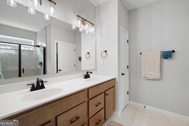 109 Aspen Way, Dallas, GA 30157 - bathroom with double vanity, marble finish floor, a stall shower, and a sink