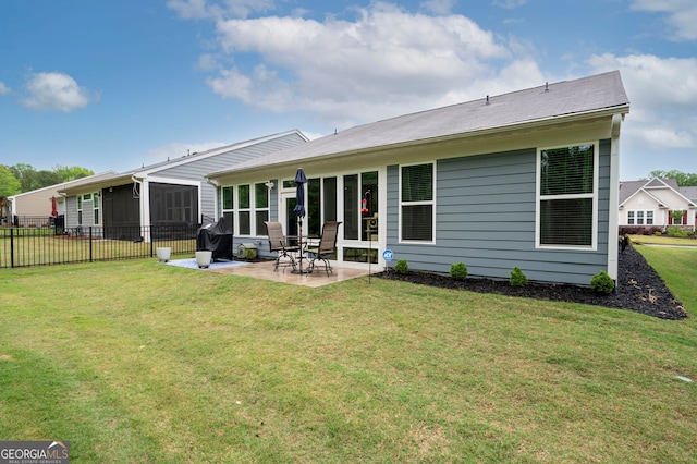 109 Aspen Way, Dallas, GA 30157 - back of property featuring a yard, a patio area, and fence