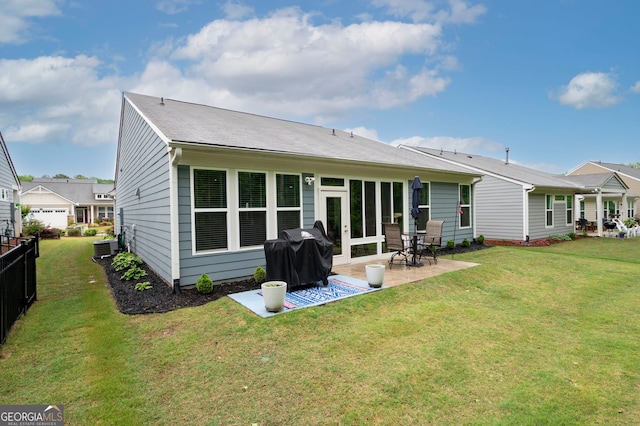 109 Aspen Way, Dallas, GA 30157 - rear view of house with a lawn, central AC unit, a patio, and fence