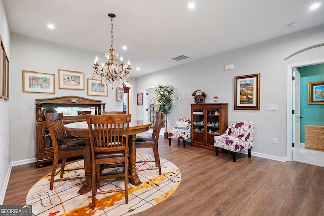 109 Aspen Way, Dallas, GA 30157 - dining room featuring recessed lighting, an inviting chandelier, visible vents, and wood finished floors