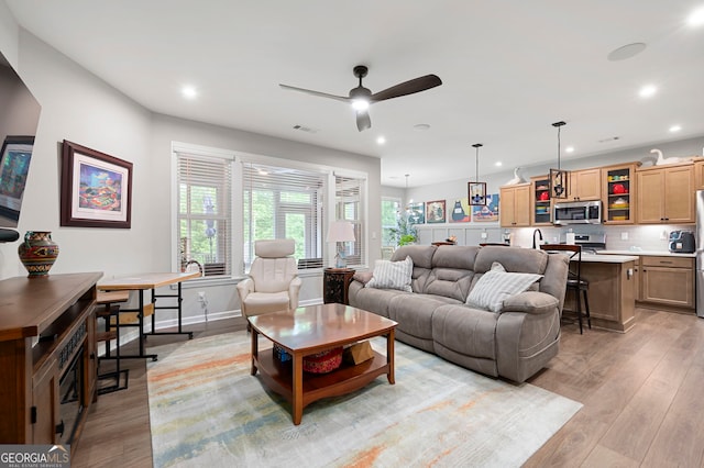 109 Aspen Way, Dallas, GA 30157 - living area featuring light wood-style floors, a ceiling fan, visible vents, and recessed lighting