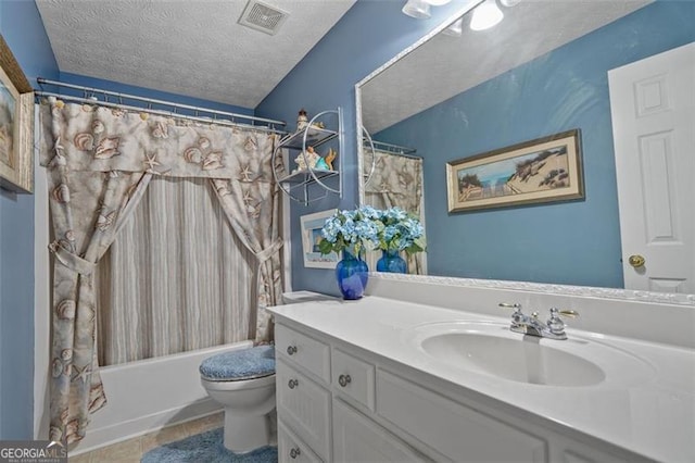 238 Diamond Valley Pass, Canton, GA 30114 - full bathroom featuring a textured ceiling, visible vents, vanity, tile patterned floors, and toilet